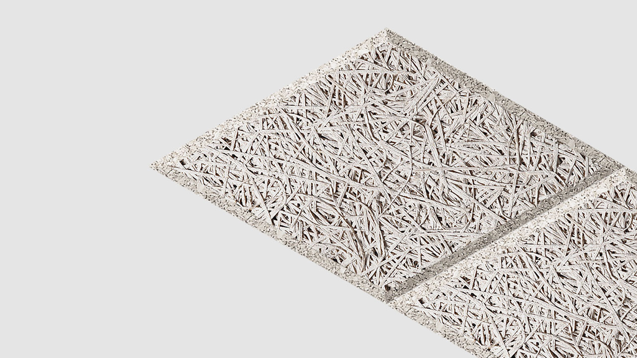 Two square ceiling tiles with a rough, interwoven wood fiber texture are positioned diagonally on a plain white background.