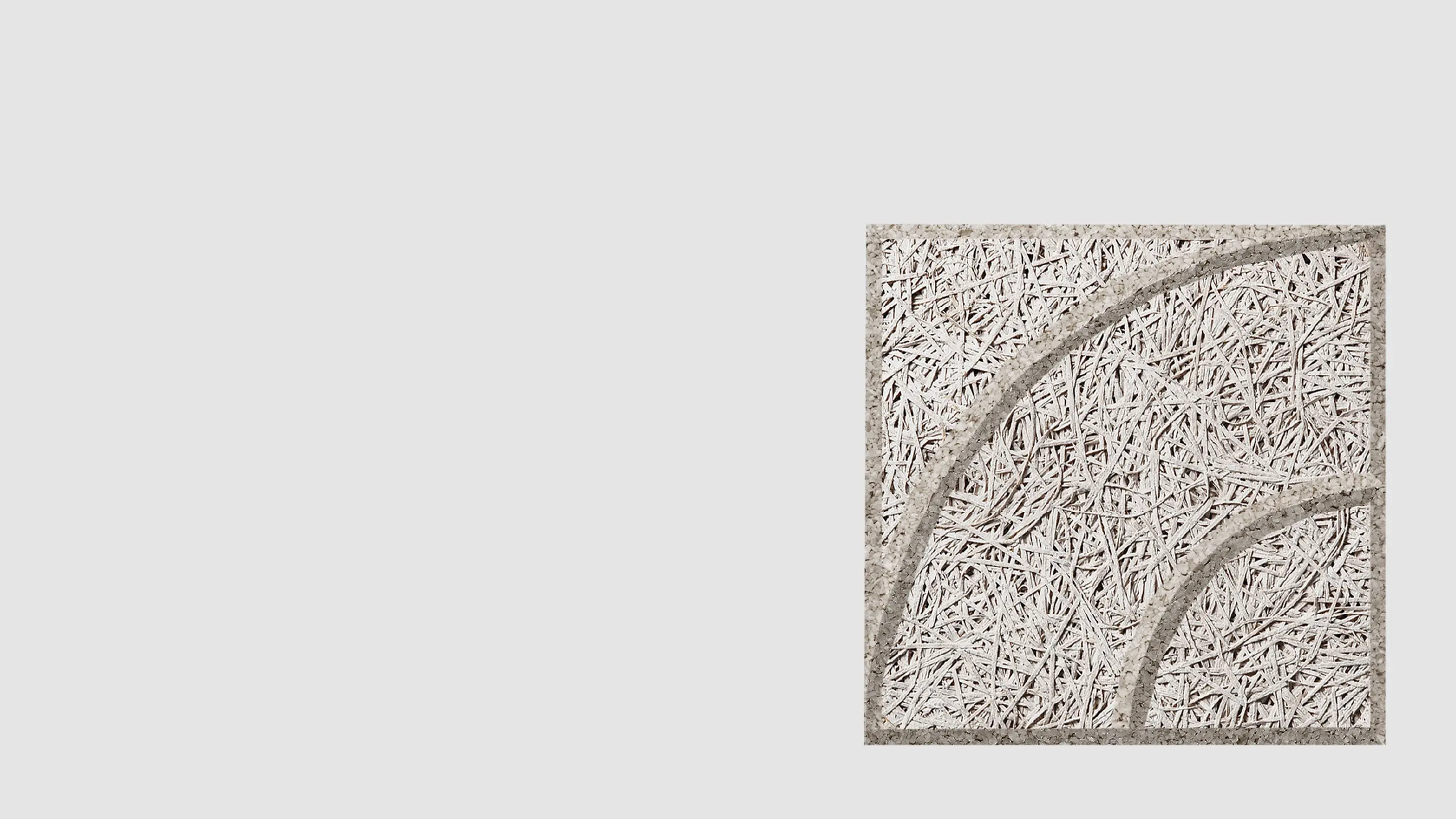 A square panel with a textured, woven straw-like surface and two curved raised lines, positioned on a plain light gray background with ample empty space on the left.
