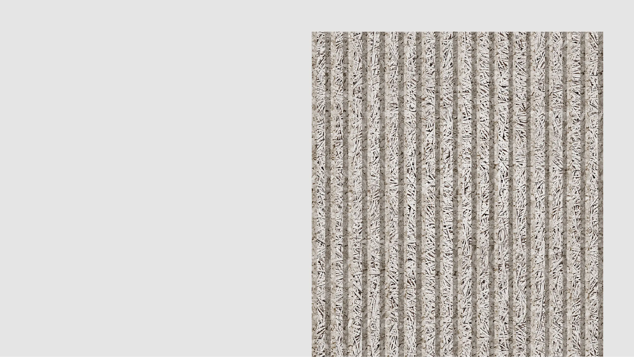A rectangular panel with a vertically ridged surface in gray and beige tones stands against a plain light gray background, occupying the right side of the image.