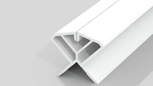 A white, angled plastic or metal extrusion with a T-shaped base and triangular hollow sections, displayed on a reflective gray surface.