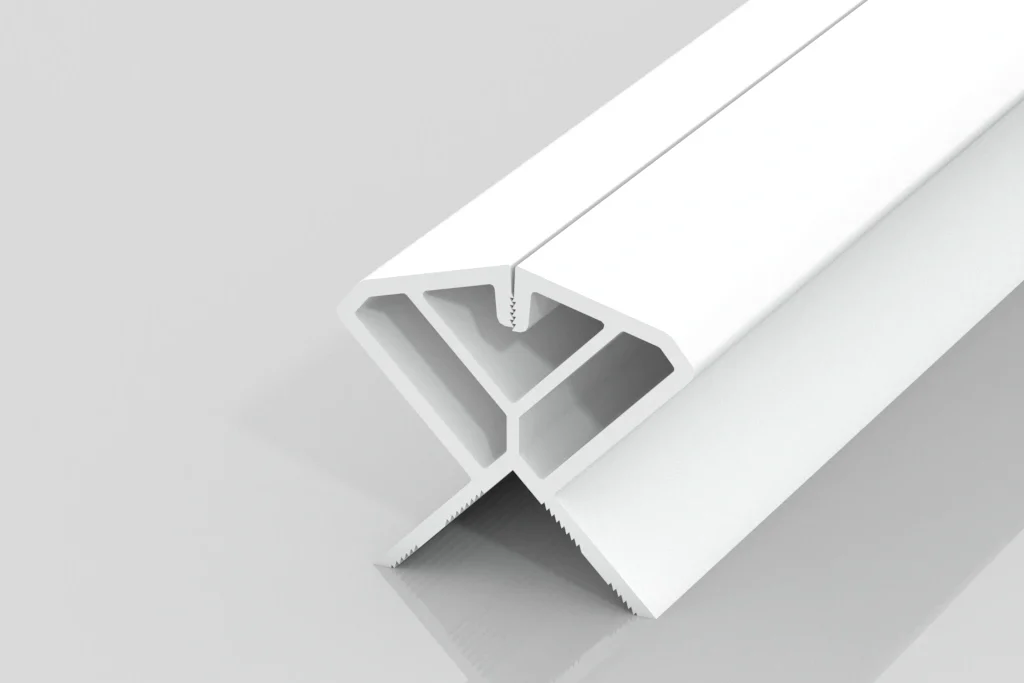 A white, angled plastic or metal extrusion with a T-shaped base and triangular hollow sections, displayed on a reflective gray surface.