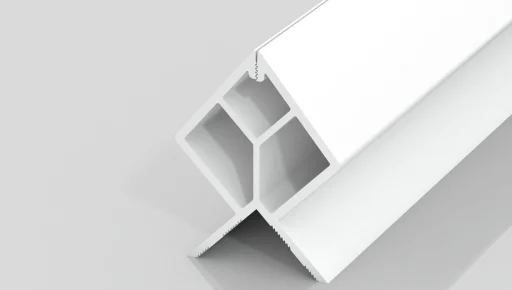 A white, angular plastic or metal extrusion with hollow rectangular and triangular sections, displayed on a reflective surface with a clean, minimal background.