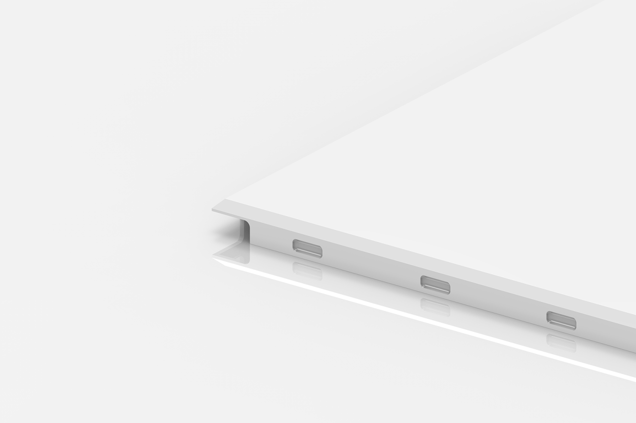 A close-up of a white, rectangular metal panel with beveled edges and rectangular cut-out slots along one side, set against a plain white background.