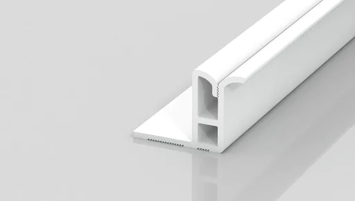 A white, L-shaped plastic or metal extrusion profile with hollow channels and a flat base, displayed on a reflective light gray surface.