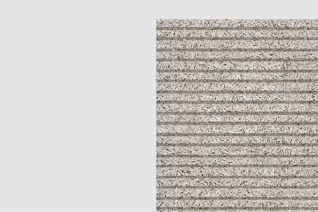 A rectangular panel featuring horizontal rows of tightly packed, shredded paper strips in varying shades of white, gray, and beige, creating a textured, layered pattern against a plain light gray background.